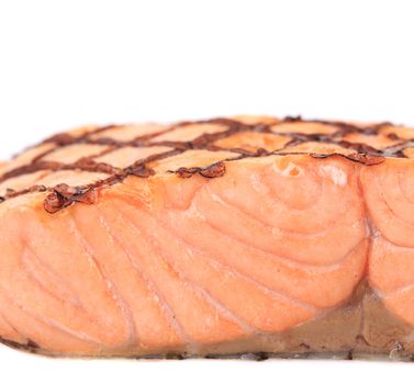 Close up of grilled salmon fillet. Whole background.