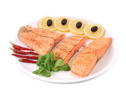 Grilled salmon fillets with rosemary. Isolated on a white background.