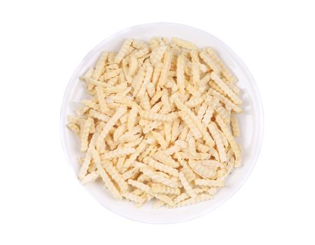 Abundant frozen french fries in plate. Isolated on a white background.