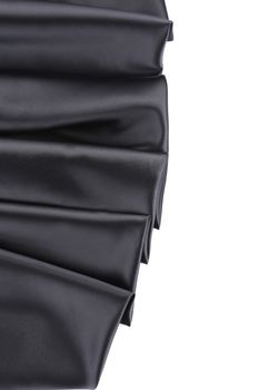 Black silk soft folds close up. Texture. Whole background.