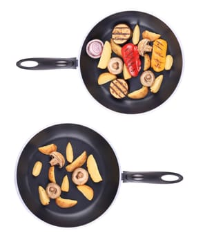 Two frying pans with vegetables. Isolated on a white background.