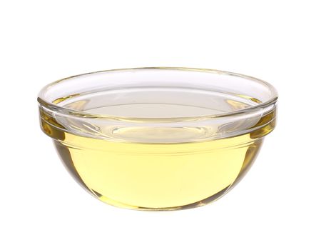 Sunflower oil in glass bowl. Isolated on a white background.