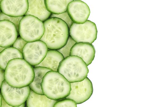 Close up fresh green sliced cucumber. Whole background.