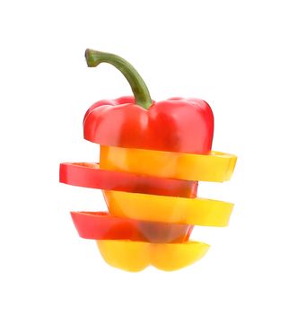 Multi-colour slices of peppers. Isolated on a white background.