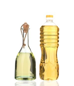 Small bottles of olive oil. Isolated on a white background.