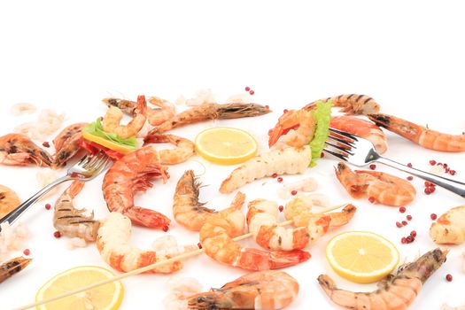 Fresh cooked shrimps composition with lemon. Whole background.