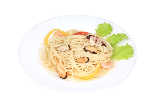 Seafood salad with spaghetti. Isolated on a white background.