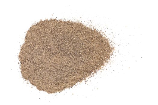 Pile of ground pepper. Isolated on a white background.