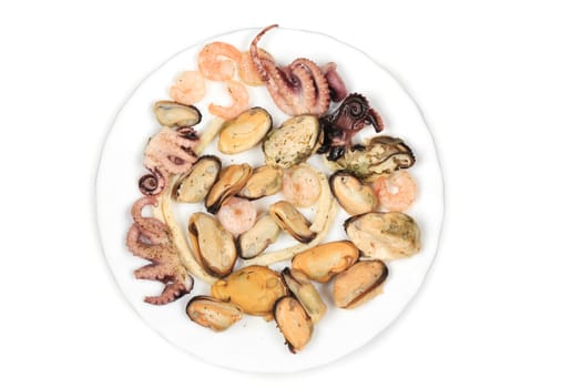 Mixed seafood plate. Isolated on a white background.