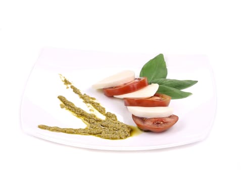 Caprese salad. Isolated on a white background.