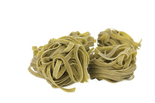 Tagliatelle paglia italian pasta. Isolated on a white background.