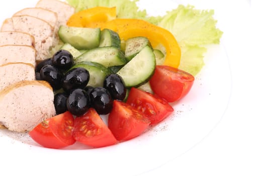Chicken salad and vegetables. Close up. Whole background.