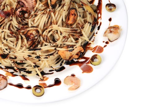 Seafood salad with spaghetti. Close up. Whole background.