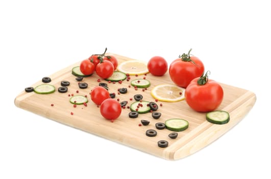 Composition of tomatoes and olives. Isolated on a white background.