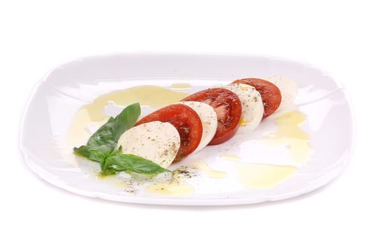 Caprese salad. Isolated on a white background.