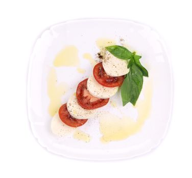 Caprese salad. Isolated on a white background.