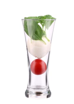 Glass of tomato and mozarella. Isolated on a white background.