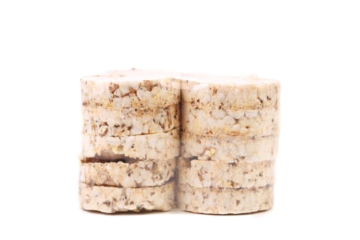 Stacks of puffed rice snack. Isolated on a white background.