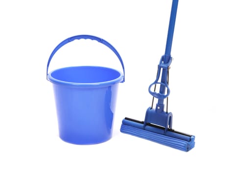 Blue bucket with sponge mop. Isolated on a white background.