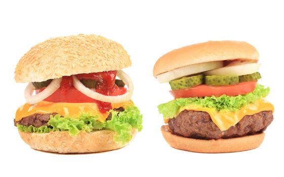 Close up of two tasty hamburgers. Isolated on a white background.