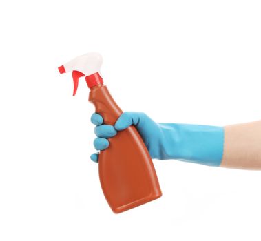 Hand in glove holding brown plastic spray bottle. Isolated on a white background.