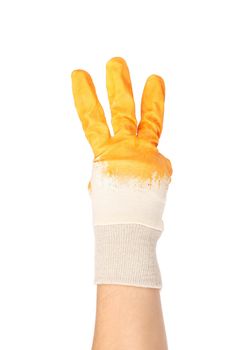 Hand in rubber glove shows three. Isolated on a white background.