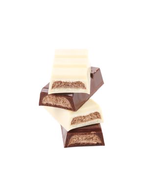 Black and white chocolate bars with filling. Isolated on a white background.