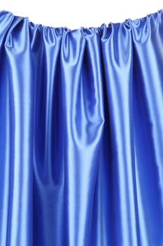Blue silk drapery. Close up. Whole background.