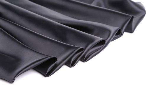 Black silk drapery. Close up. Whole background.