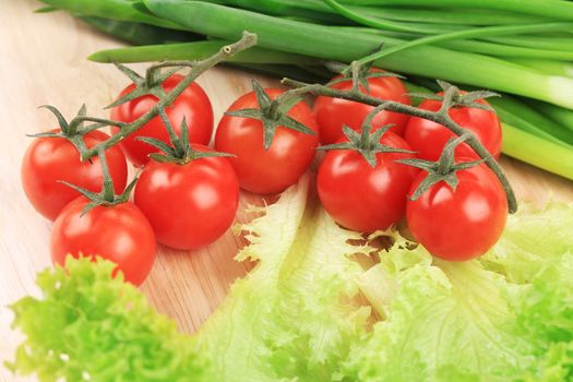 Fresh vegetables on cutting board.