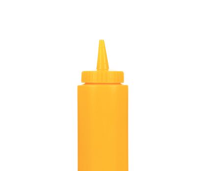 Yellow plastic container for sauce. Isolated on a white background.