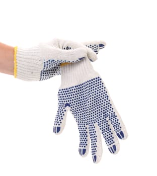 Hand holds protective gloves. Isolated on a white background.