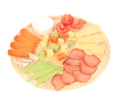 Meat and cheese on wooden desk. Isolated on a white background.