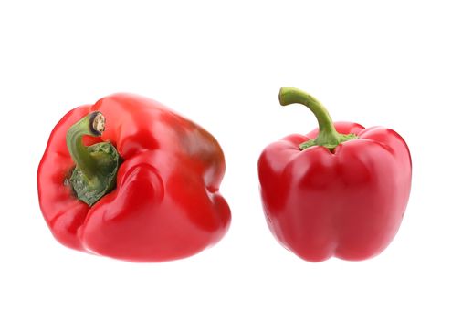 Two red bell peppers. Isolated on a white background.