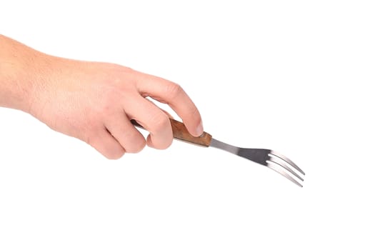 Kitchen fork in hand. Isolated on a white background.
