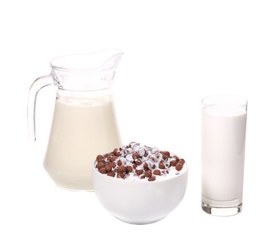 Cereal in bowl and glass jar with milk. Isolated on a white background.