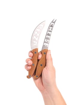 Hand holds two knifes. Isolated on a white background.