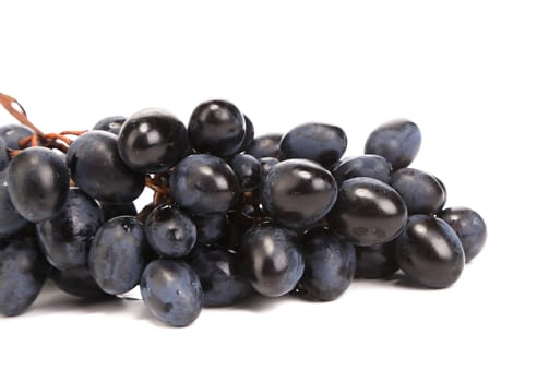 Black ripe grapes. Isolated on a white background.