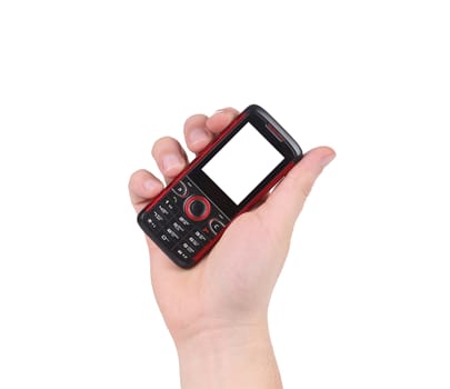 Hand holds red-black cell phone. Isolated on a white background.