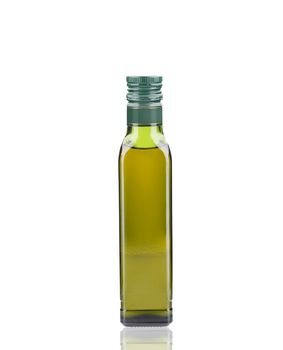 Glass bottle of olive oil. Isolated on a white background.
