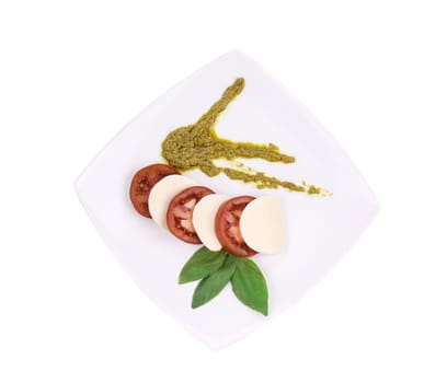 Caprese salad. Isolated on a white background.