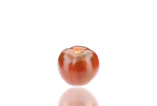 Close up of fresh tomato. Isolated on a white background.