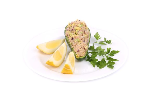 Avocado salad with tuna. Isolated on a white background.