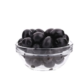 Glass bowl with black olives. Isolated on a white background.