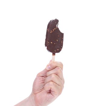 Hand holding chocolate ice cream. Isolated on a white background.
