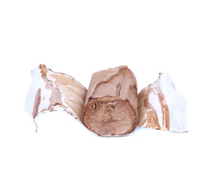 Roll of chocolate ice cream. Isolated on a white background.