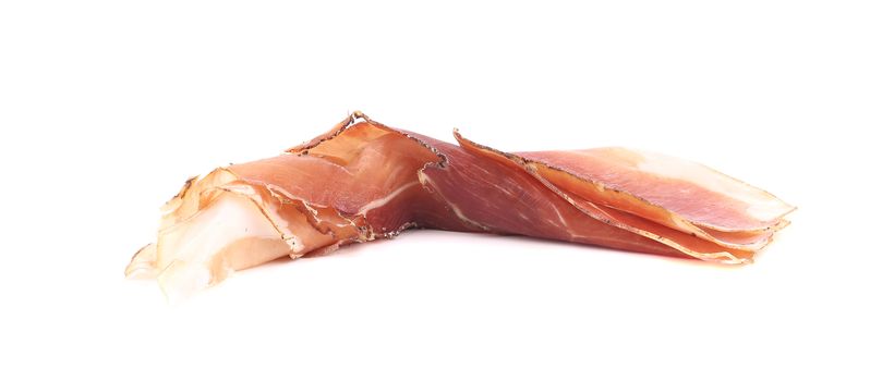 Rolled Slice of Delicious Prosciutto. Isolated on a white background.