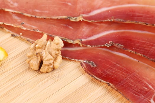 Slices of Delicious Prosciutto. Close up. Whole background.