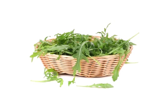 Fresh arugula salad. Isolated on a white background.