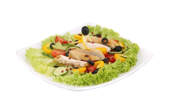 Chicken salad with tomatoes. Isolated on a white background.